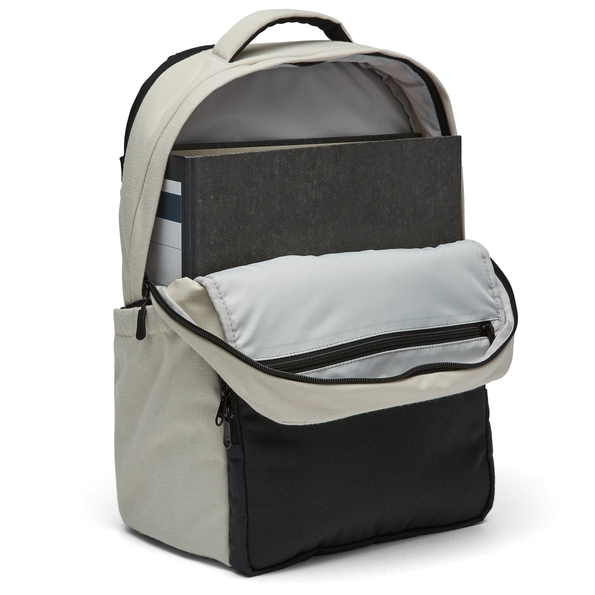 Ela Mo™ Work Rucksack | Dessert. Ein großer grauer Innenbereich des Schulrucksacks.