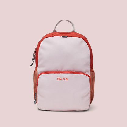 Ela Mo™ Kinderrucksack (3-6 Jahre) | Cotton Candy. Der Rucksack in Rosafarben auf hellrosa Hintergrund.