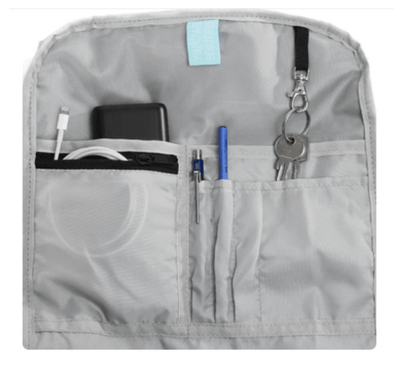 Ela Mo™ Rolltop Rucksack | Bye Bye Summer. Der graue Innenbereich des Rucksacks verfügt über mehrere kleine Fächer.