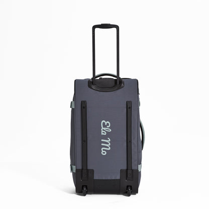 Ela Mo™ Reisetasche mit Rollen 78 Liter | Darkgrey Mint. Die Rückseite der Reisetasche mit Rollen und Herstellerlogo.